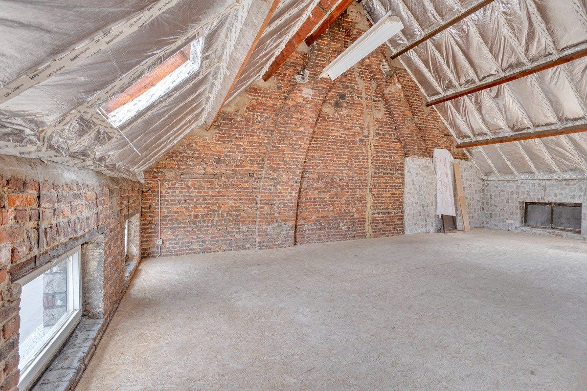 Ruim en gerenoveerd burgerwoning met stadstuin in het hart van Halle foto 15