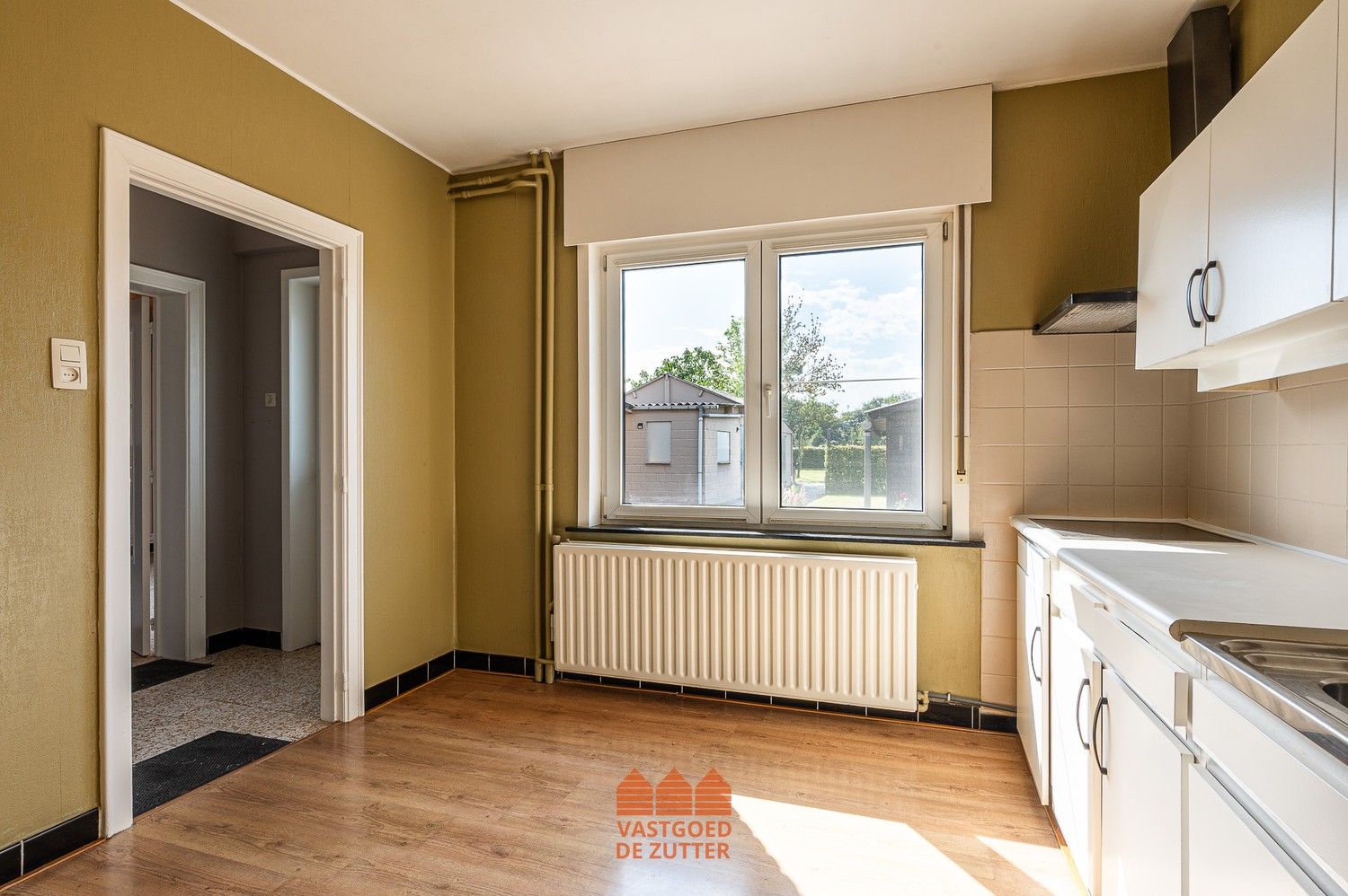 Op te frissen woning met zuid gerichte tuin op een toplocatie te Waarschoot. foto 18
