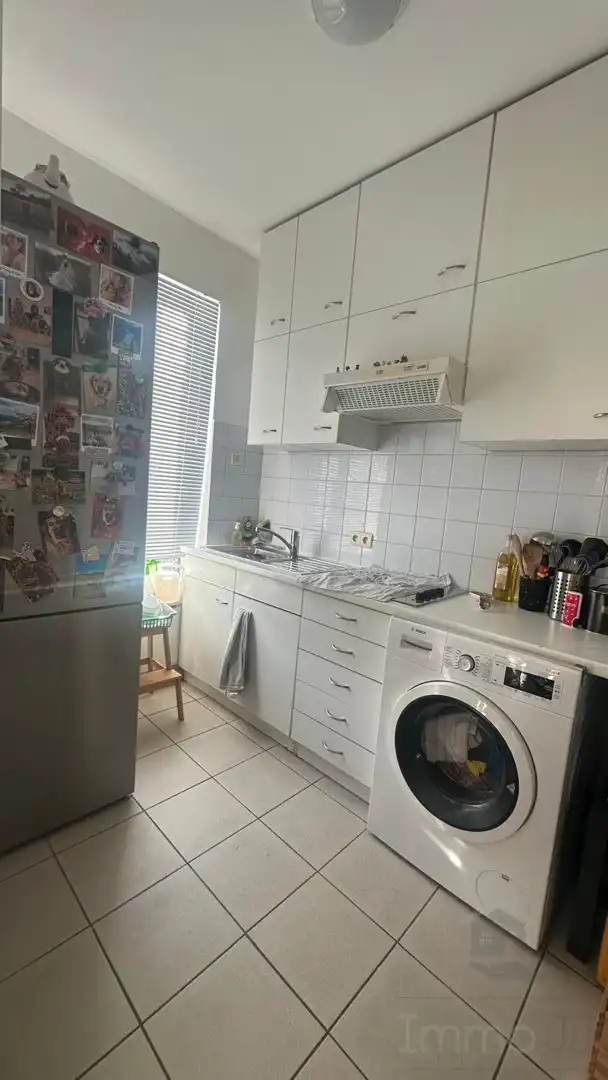 Gelijkvloers appartement met tuin en garage foto 3