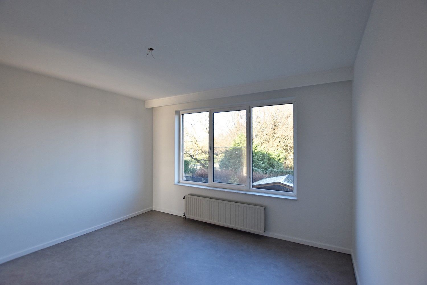 Verzorgd 2-slpk appartement met grote tuin te Borsbeek. foto 7
