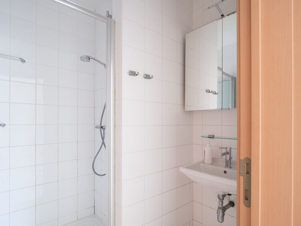 Appartement met 3 slaapkamers, aangenaam terras en autostaanplaats met prachtig en open zicht over de Leie. foto 11