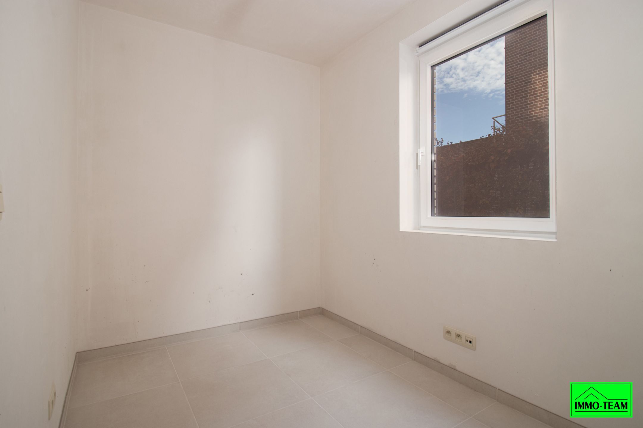 Nieuwbouw gelijkvloers appartement met terras en garage.  foto 15