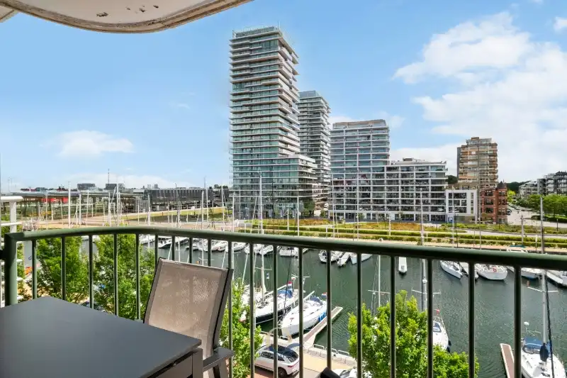 Res. Chateau Beaufort - Instapklaar 1-slaapkamerappartement + slaaphoek met panoramisch zicht op de jachthaven ! foto {{pictureIndex}}