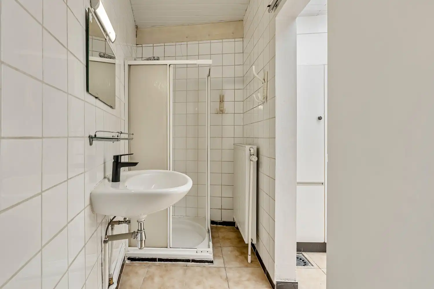 Goed gelegen rijwoning met 2 slaapkamers en een af te werken zolderruimte te Leuven! foto 8
