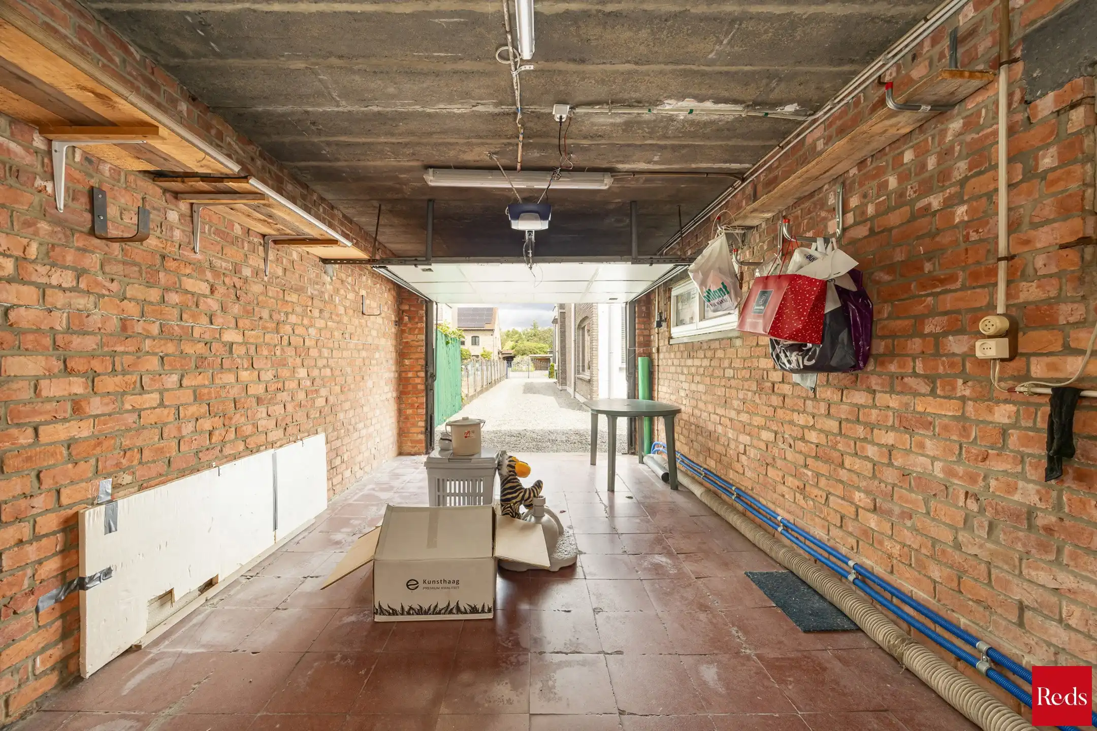  Halfopen bebouwing met tuin en garage foto 20