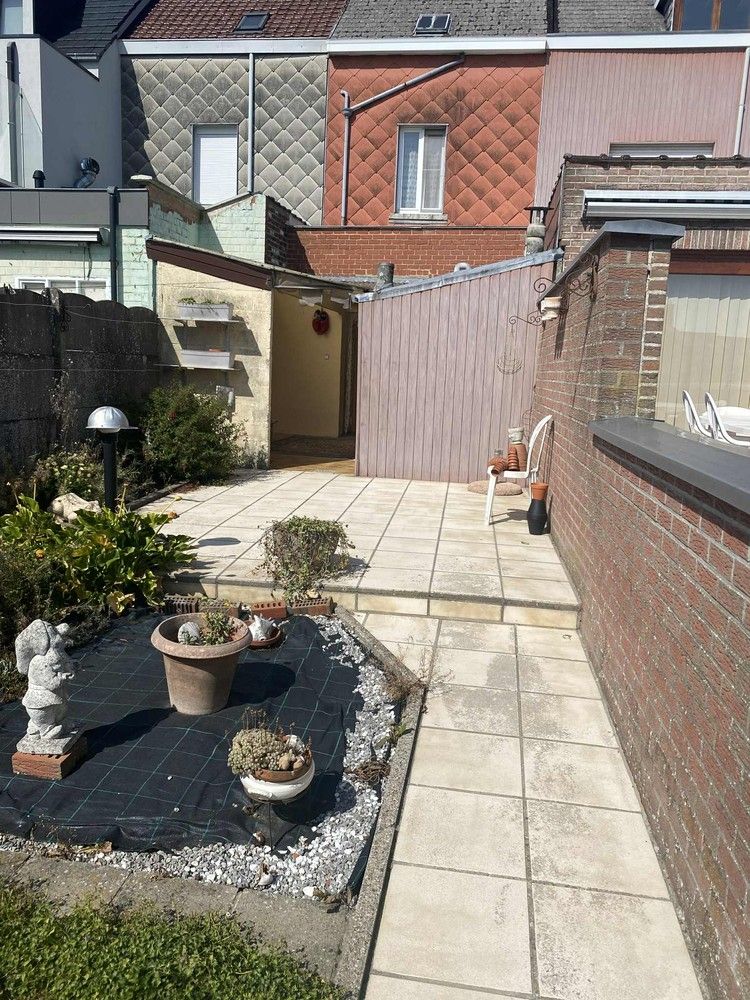 Te renoveren rijwoning met tuin en garage – centraal gelegen met veel potentieel! foto 6