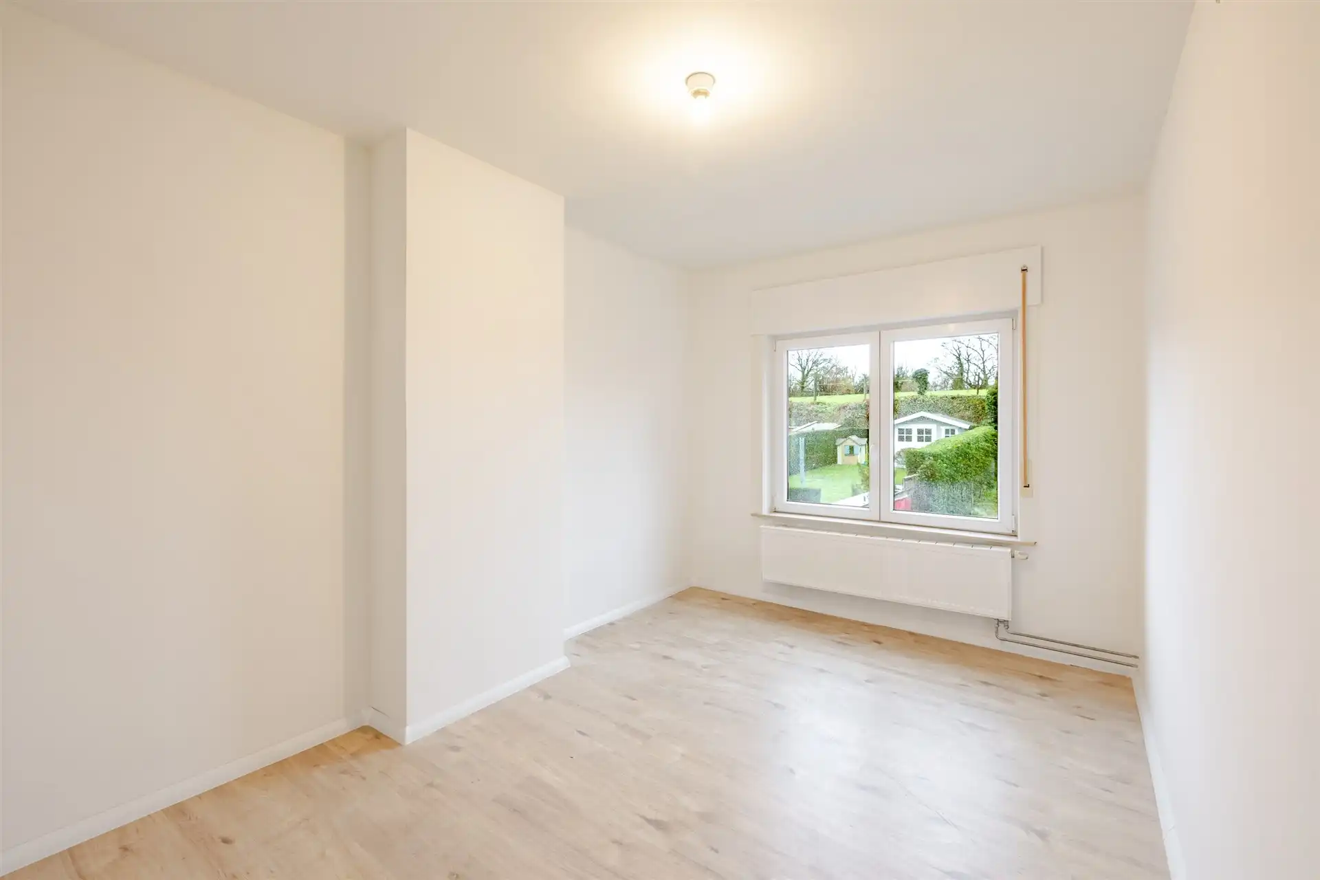 Charmante gezinswoning met tuin en zijdoorgang in rustige straat te Denderleeuw foto 21