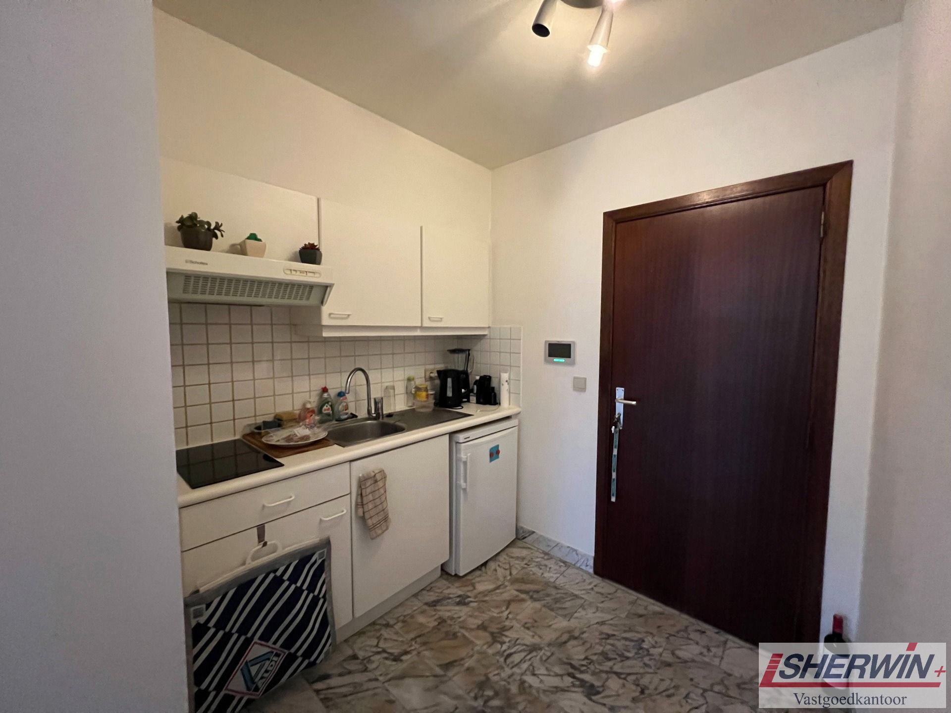 Deel van zeer goed gelegen appartementsgebouw in centrum foto 20