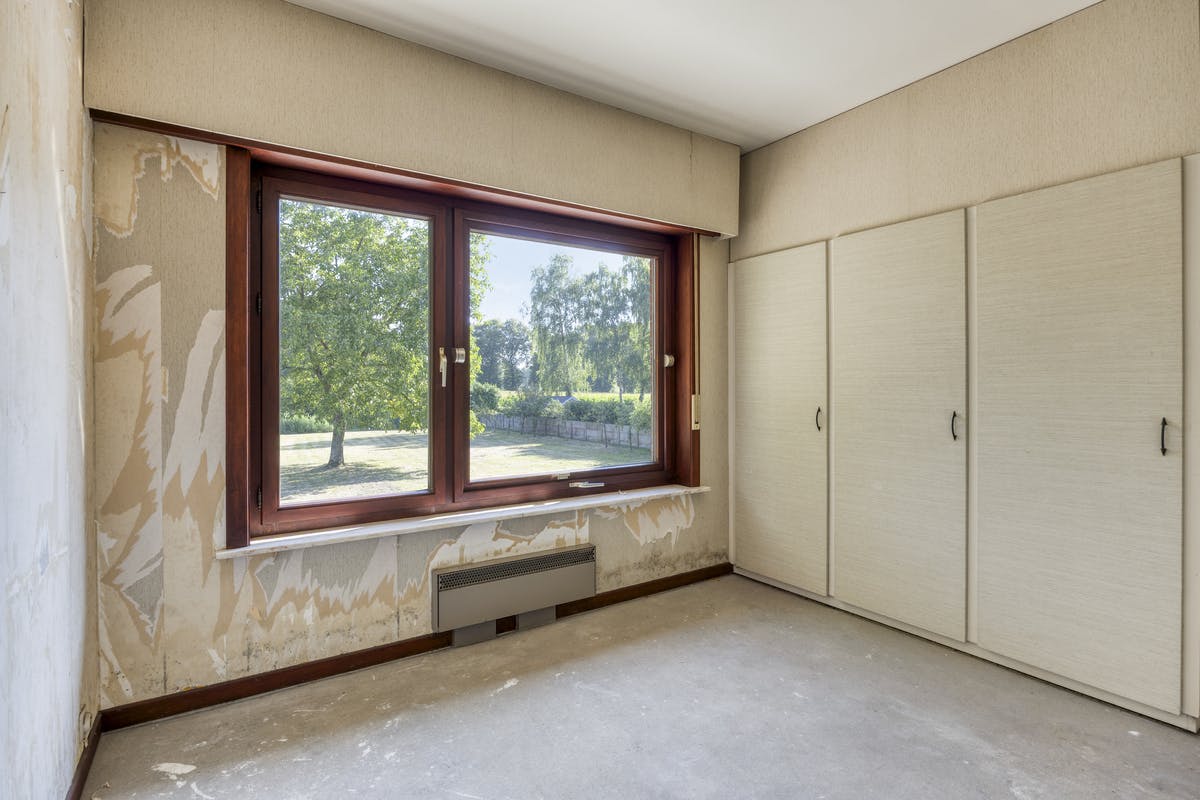 te renoveren huis op een perceel van 2445m² te koop in Geel foto 20
