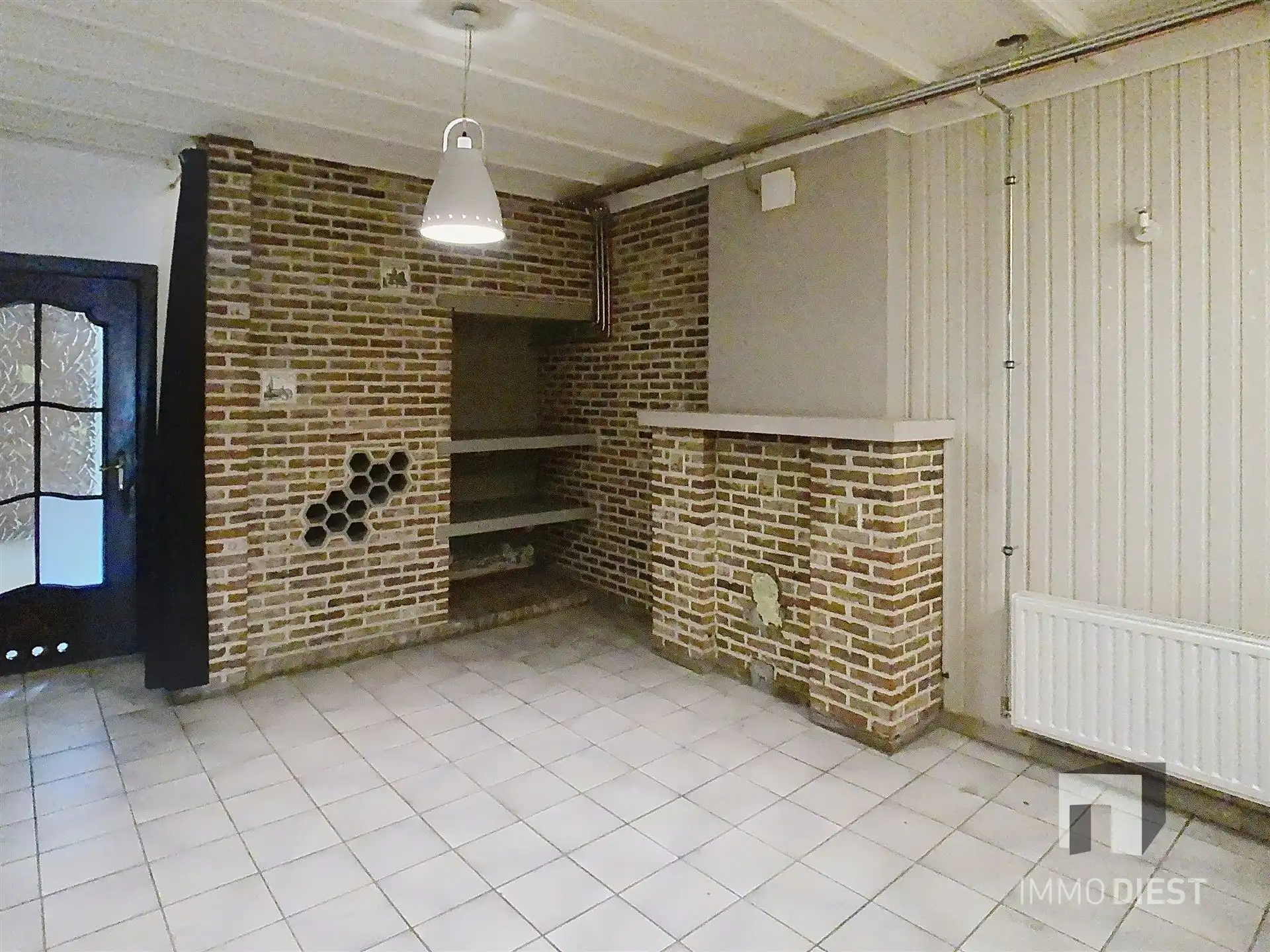 Gezellige rijwoning met terras en tuin foto 5