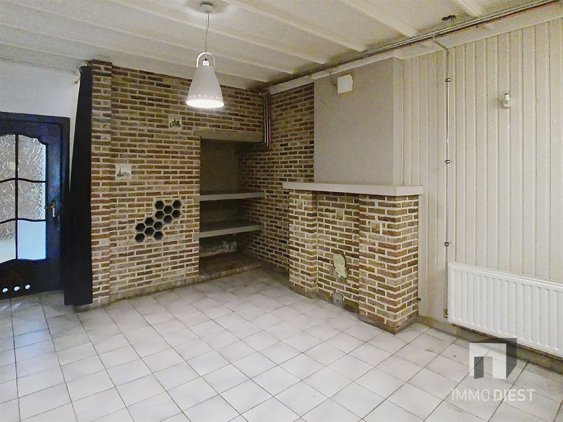 Gezellige rijwoning met terras en tuin foto 5