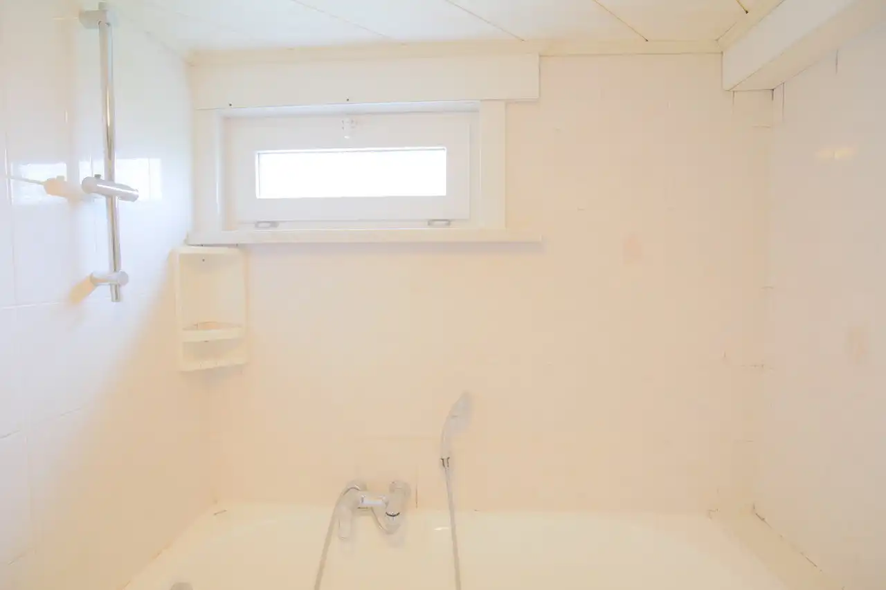 Rijwoning met terras en tuin foto 8