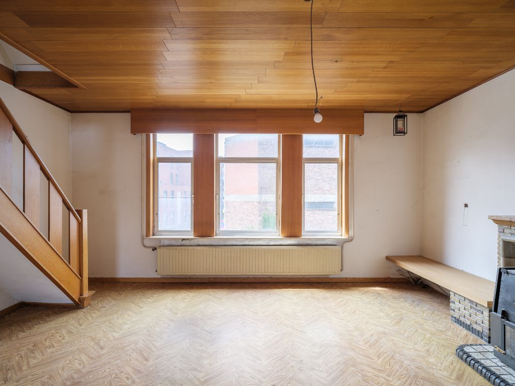 Te renoveren woning met atelier/loods, ruime tuin en bijzonder veel potentieel op een boogscheut van het stadscentrum. foto 6
