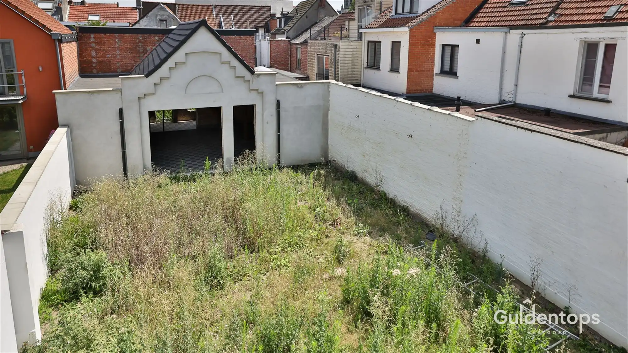 Knap gelijkvloers appartement in hartje Lier met grote tuin foto 7