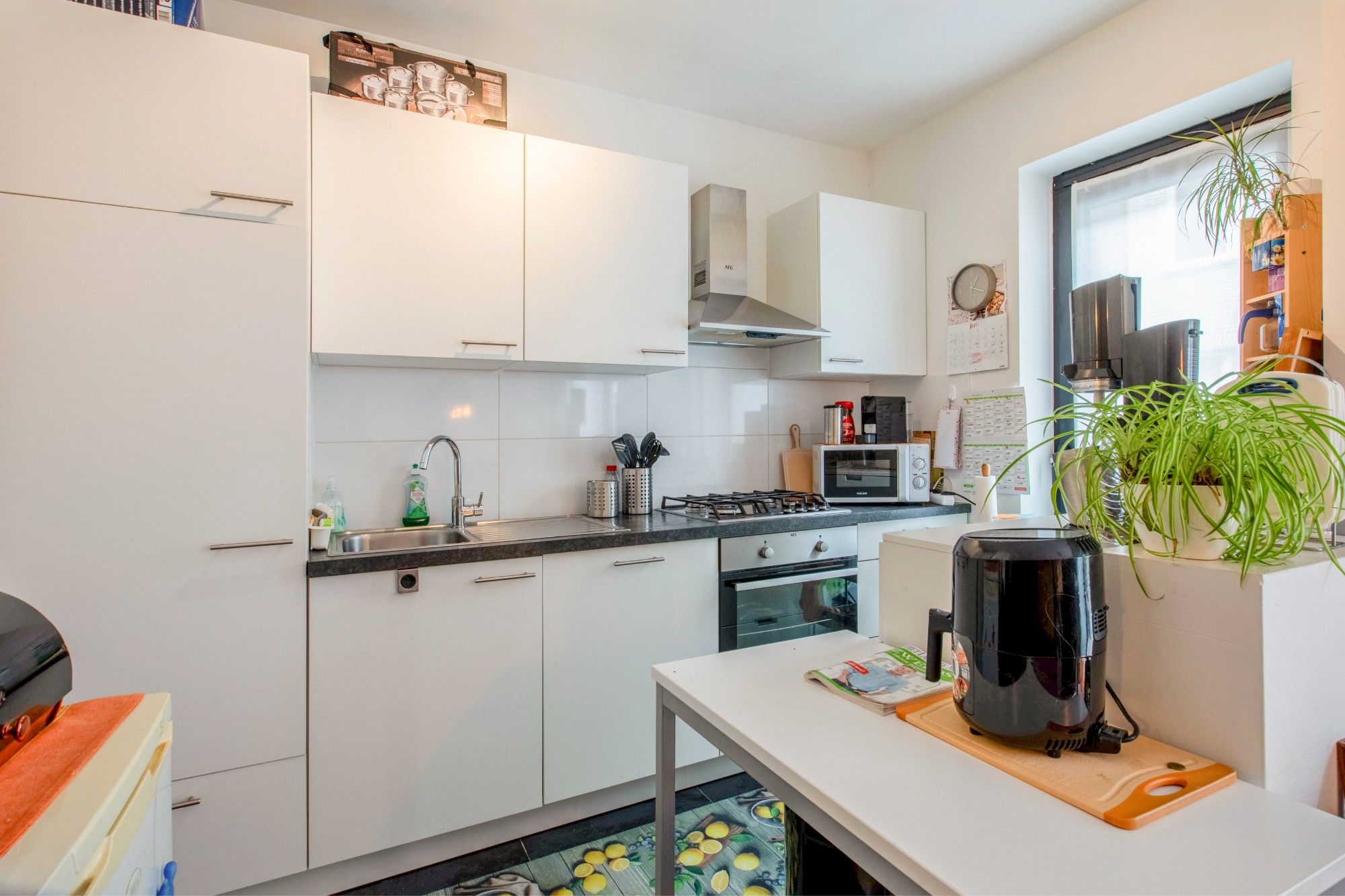 Instapklaar éénslaapkamerappartement met terras in centrum Beveren foto 4