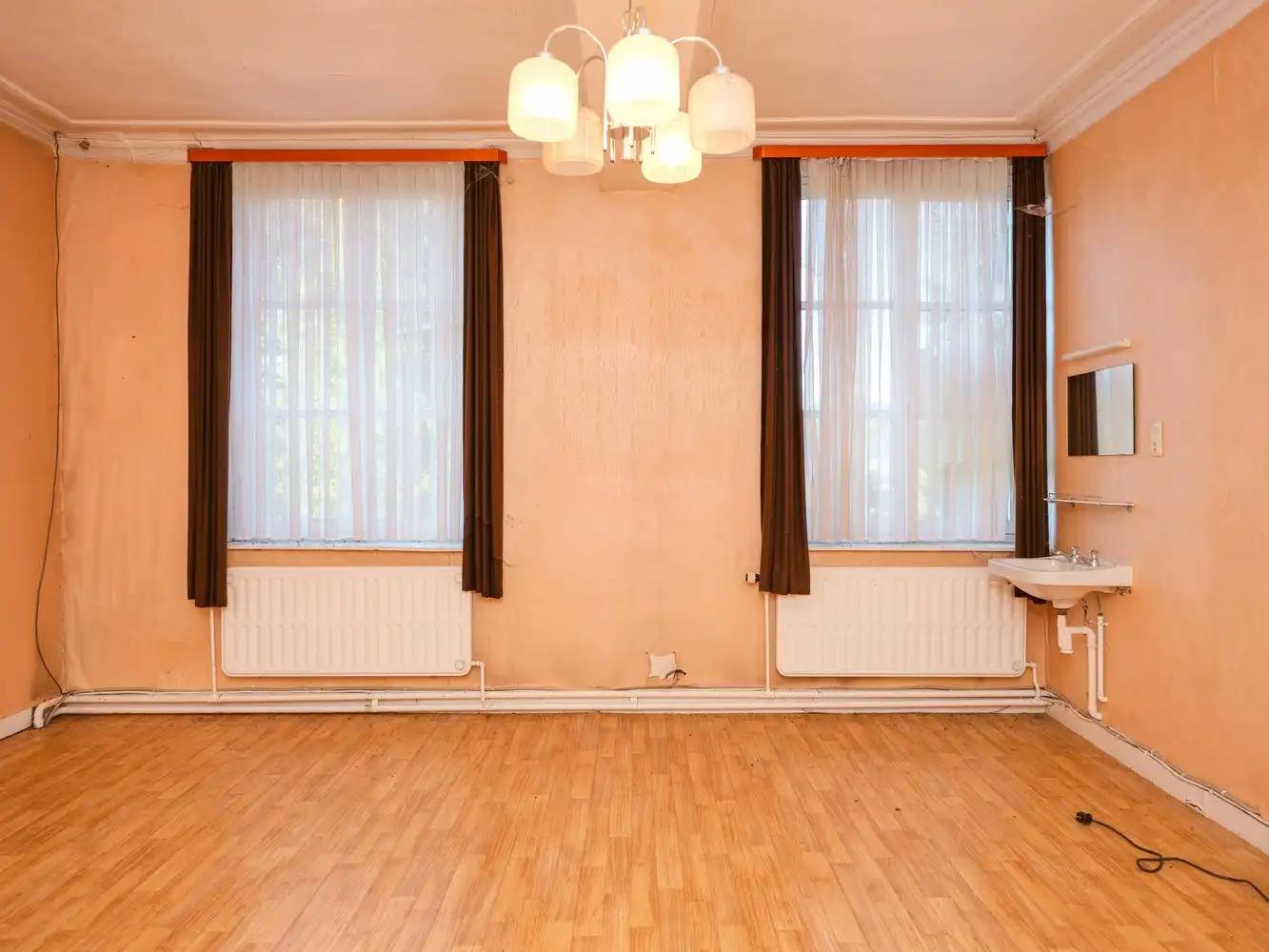 Voor liefhebbers van karaktervolle panden: unieke pastorie in dorpscentrum foto 33