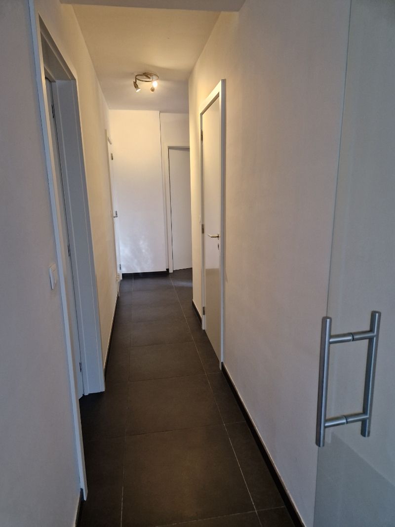 Prachtig gelijkvloersappartement met 2 slaapkamers,  tuin en garage foto 7