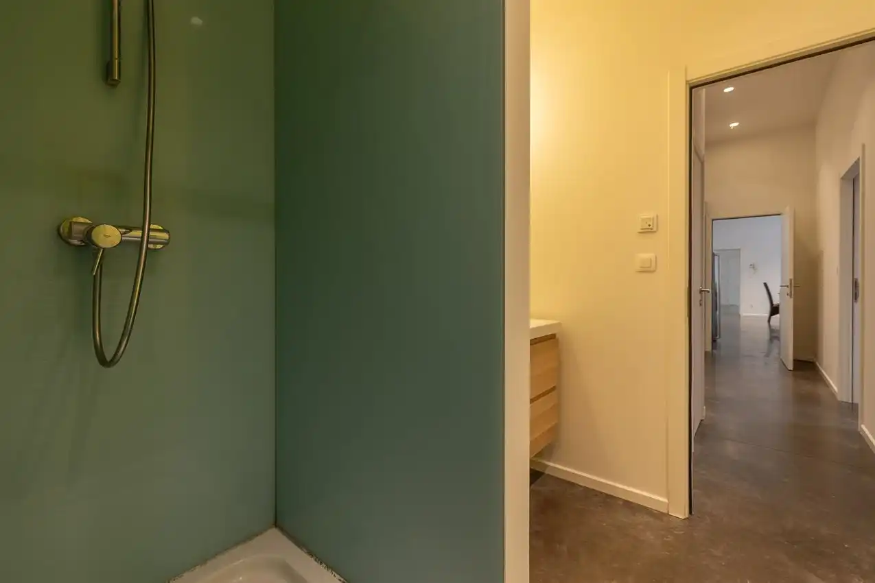 Ruim gelijkvloers appartement met zonnige tuin op toplocatie foto 24