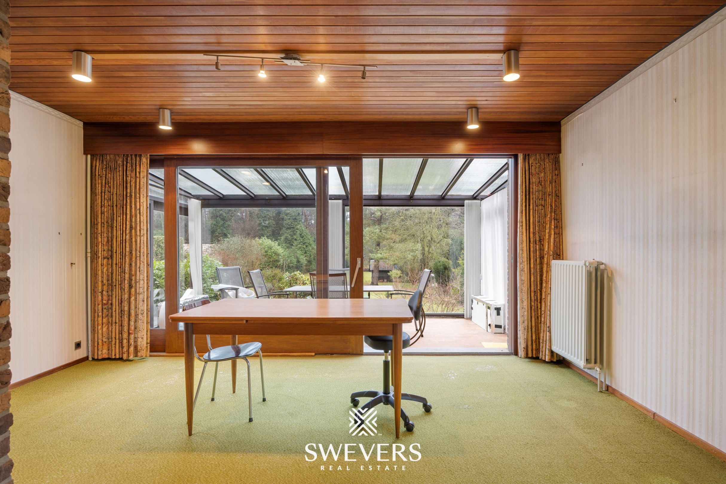 Vrijstaande woning met 329 m² wooncomfort, praktijkruimte en grote tuin foto 5