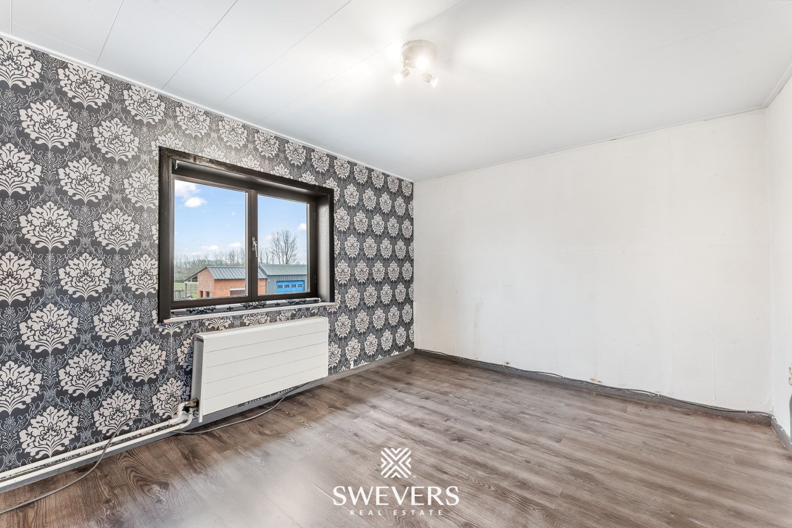 Instapklare woning met handelszaak en appartement in Geetbets foto 34