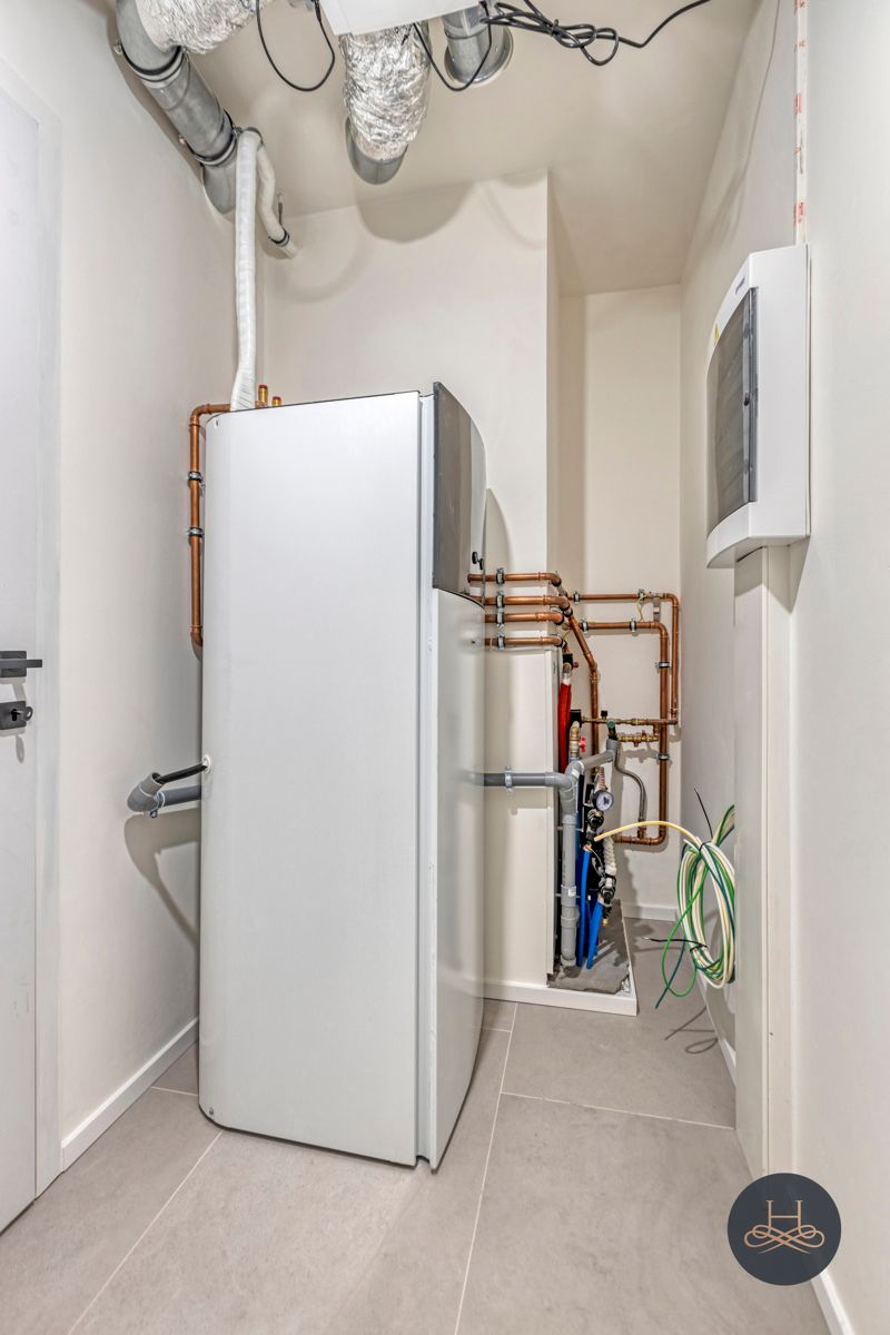 Uniek, ruim dakappartement met staanplaats en zicht op groen foto 17