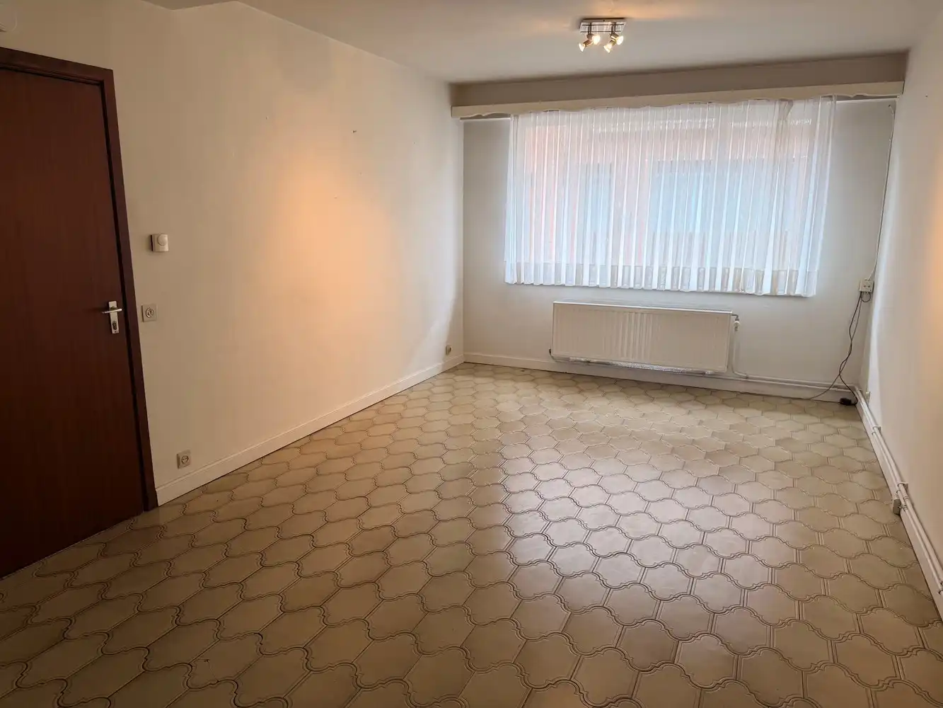 Te renoveren gelijkvloers appartement met 1 slaapkamer nabij de Grote Markt foto 3