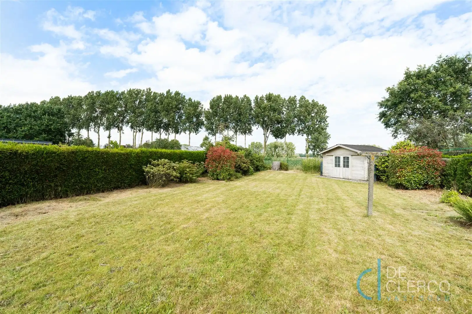 Woning met goed onderhouden tuin te koop in groot Lochristi! foto 14