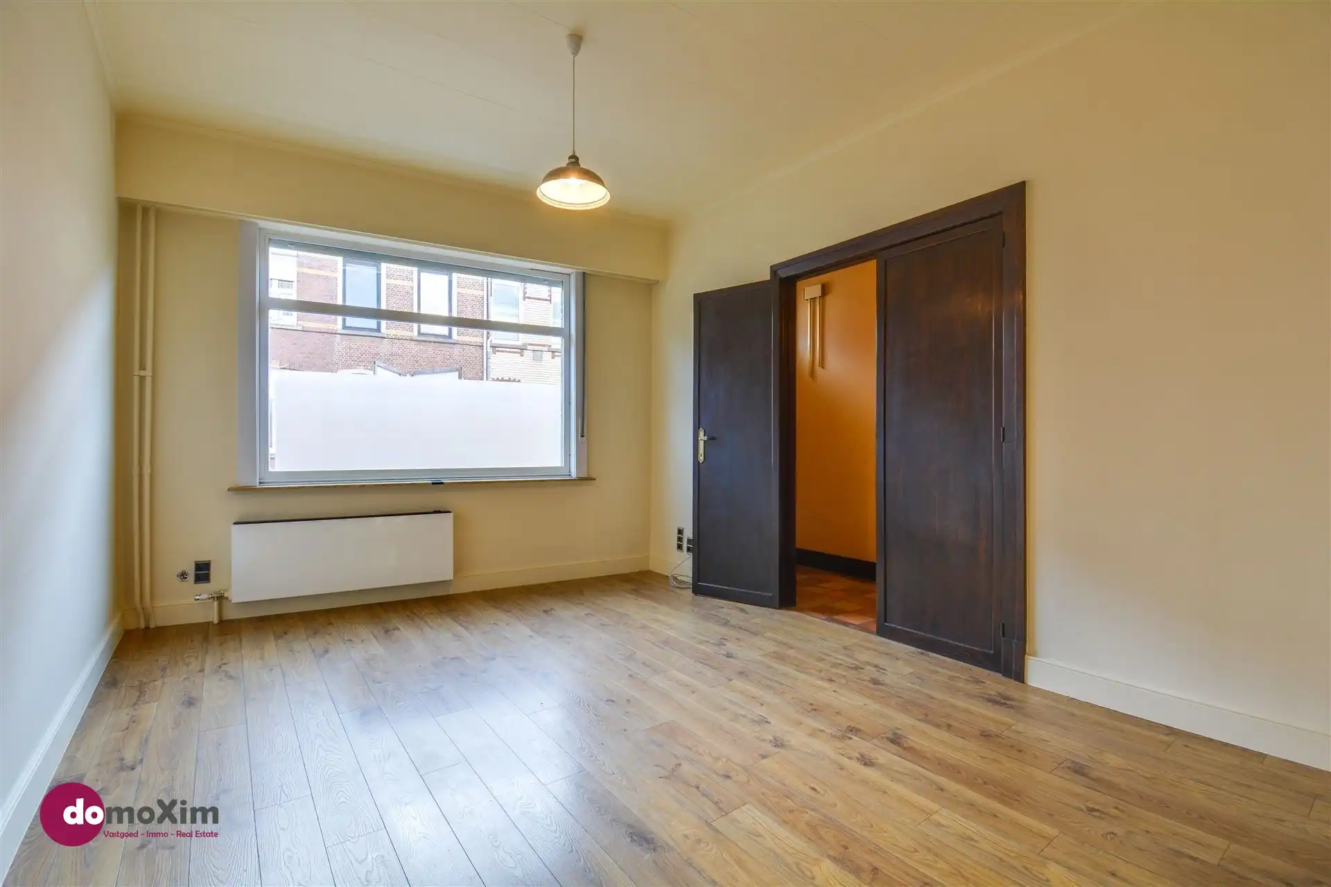 Ruime, karaktervolle stadswoning met twee garageboxen en tuin in Mechelen foto 4