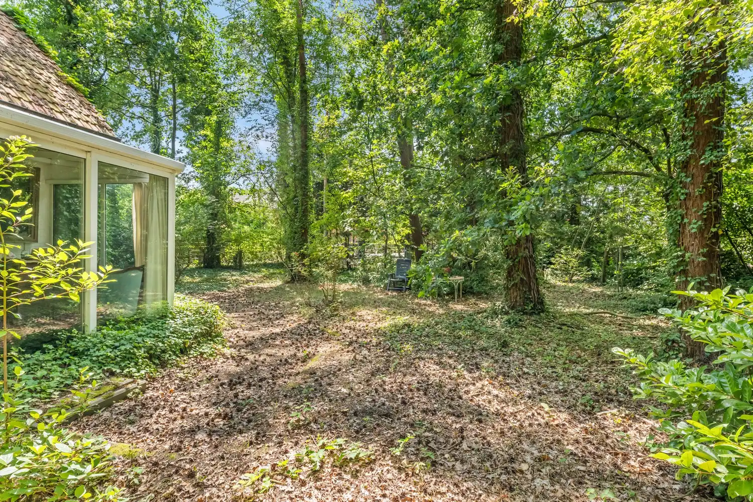Unieke boswoning op een prachtig groen perceel van 1.454 m² foto 21