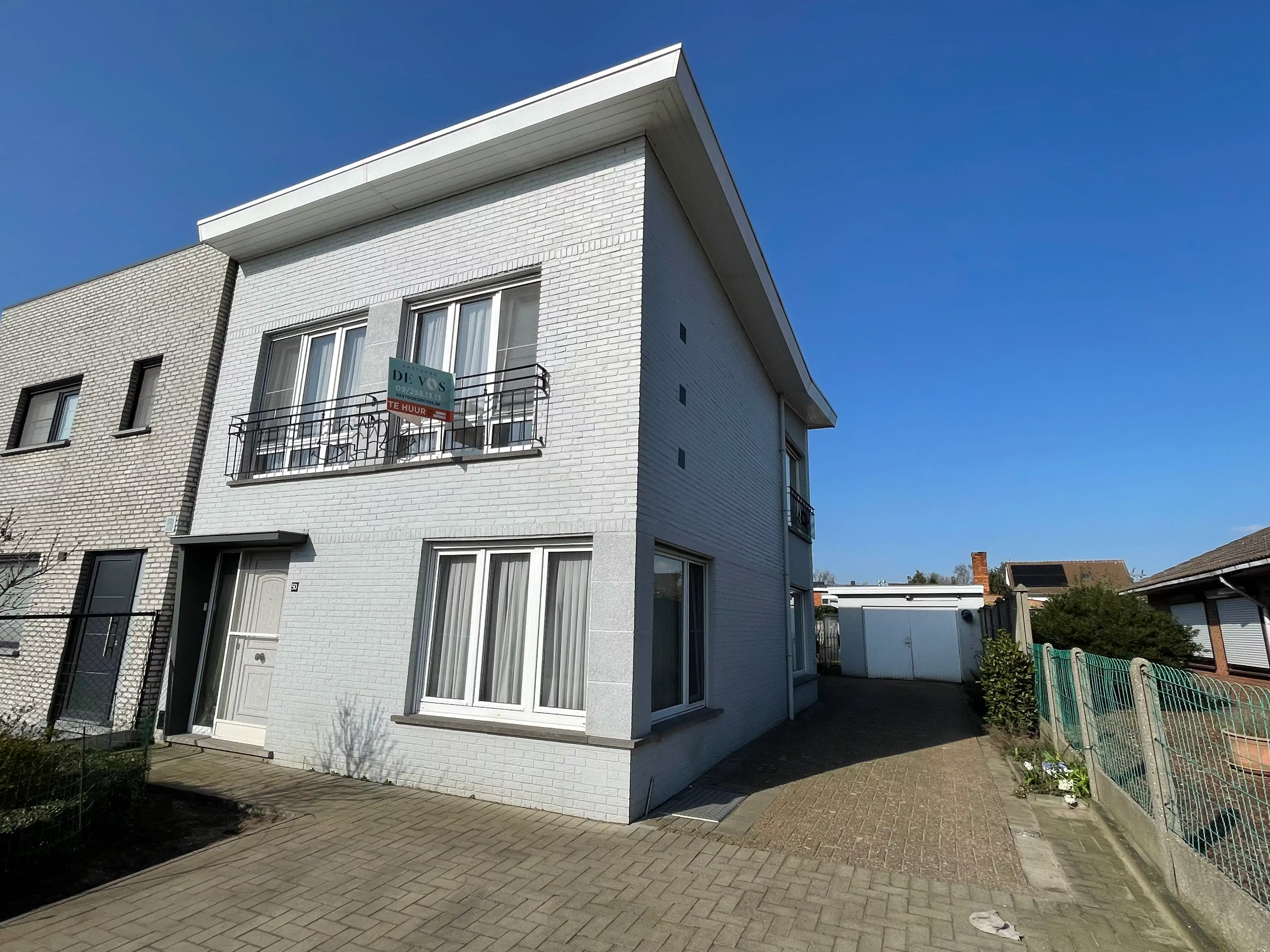 Ruime halfopen bebouwing met 3 slaapkamers, tuin en garage foto 20