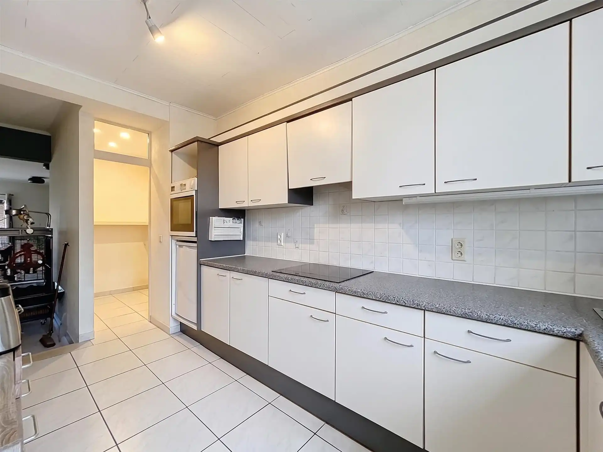 OPBRENGSTEIGENDOM MET 3 VOLLEDIG VERHUURDE APPARTEMENTEN – UITSTEKENDE INVESTERING IN SINT-PAUWELS foto 18