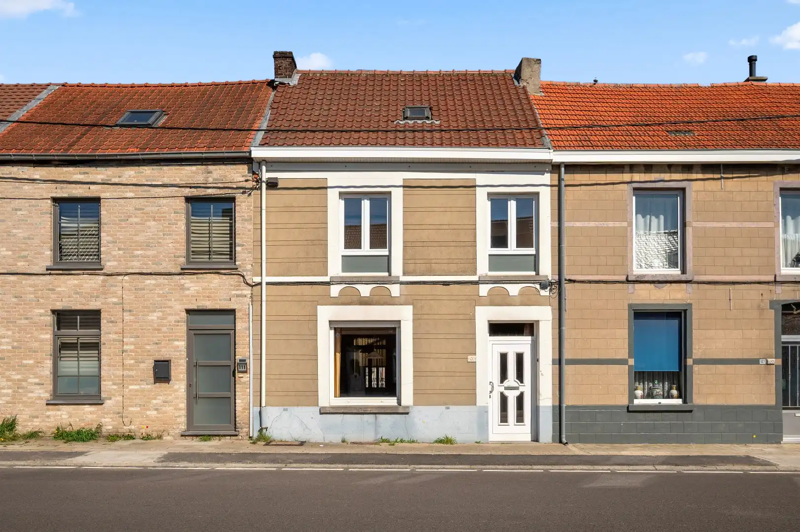 Hoofdfoto van de publicatie: Op te frissen rijwoning op de Tiense stadsrand met tuin en 2 parkeerplaatsen