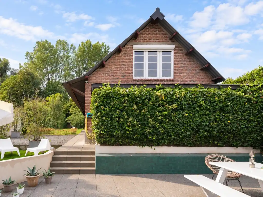 Karaktervolle woning met polyvalente achterbouw en aangename tuin in Westrem. foto 12