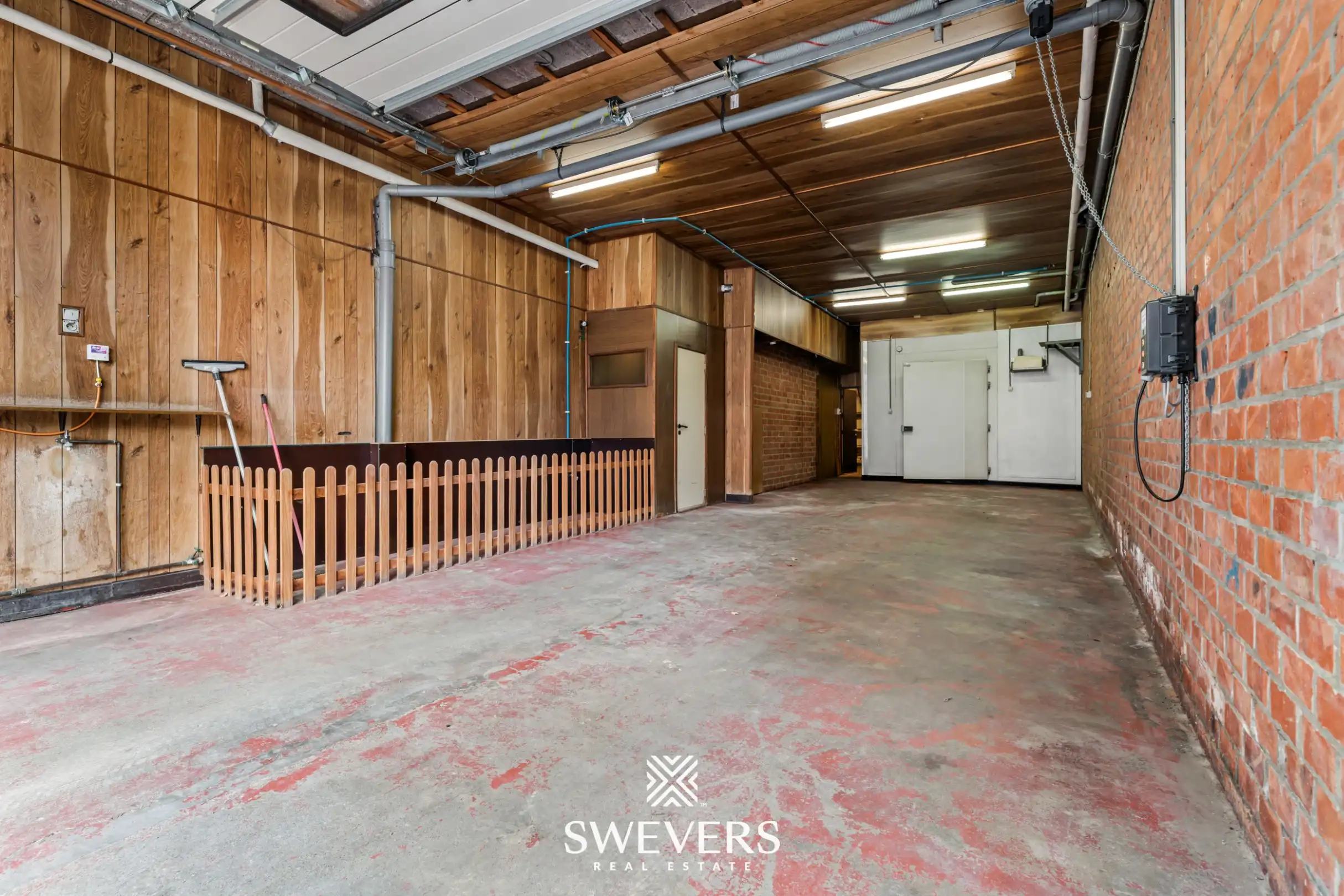 223 m² woonruimte met uitzonderlijke garage van ca. 100 m² nabij centrum foto 17