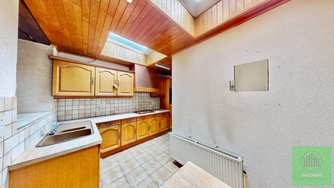 Te koop – Renovatieproject met potentieel in Menen foto 4