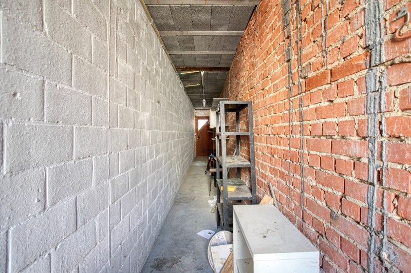 Gezellige woning met binnenkoer TE KOOP in het hart van Sint-Eloois-Vijve! foto 15