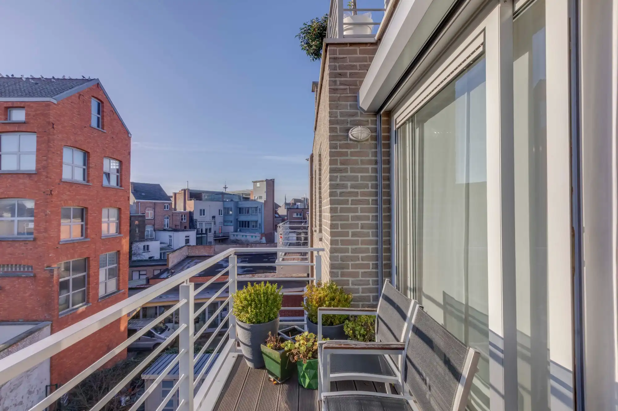 Ruim duplexappartement (123 m²) met 3 slaapkamers, 3 terrassen en autostaanplaats inclusief op toplocatie nabij station Sint-Niklaas foto 20
