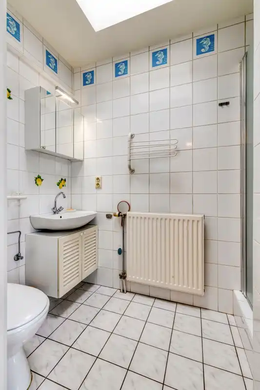 Appartement met 1 slaapkamer en twee ruime zonneterrassen, met een parkeerplaats in het gebouw die samen met het appartement aangekocht dient te worden. foto 14