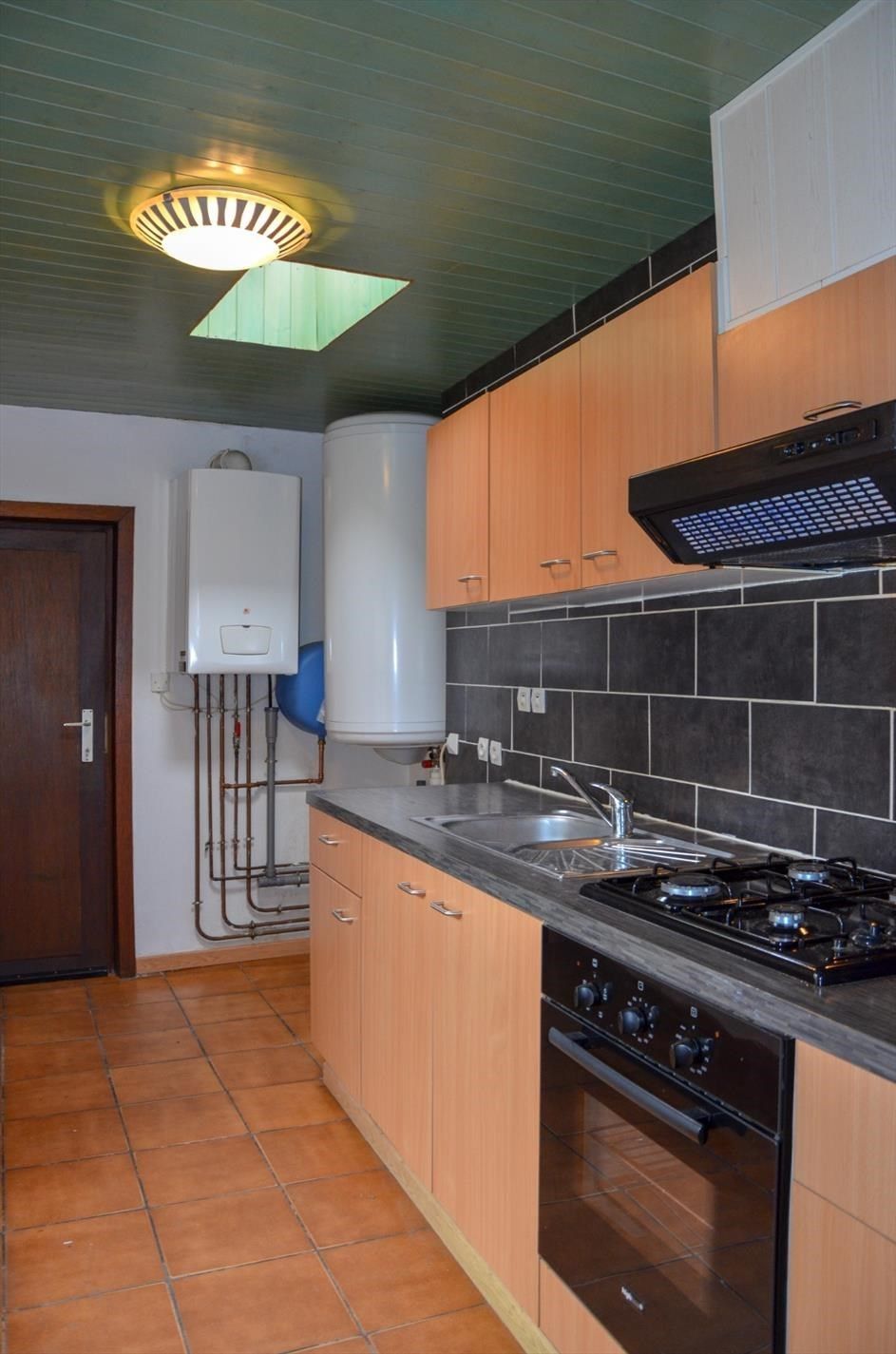 Hoekwoning met 2 slaapkamers en koertje. foto 3