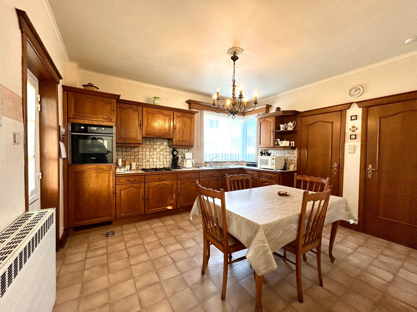 Degelijke, te renoveren half open bebouwing op ruim perceel. foto 11