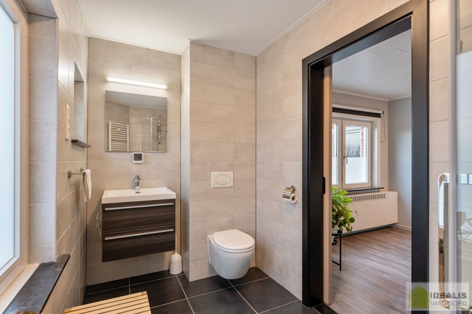 IDEALIS VASTGOED – Instapklare eengezinswoning met een lichtrijke leefruimte, 3 ruime slaapkamers (mogelijks 4), 2 badkamers op een fijn zuid-oost georiënteerd perceel! Deze woning bevindt zich op een perceel van 5a 19ca in een rustige en gezinsvriendelijke woonstraat! foto 29