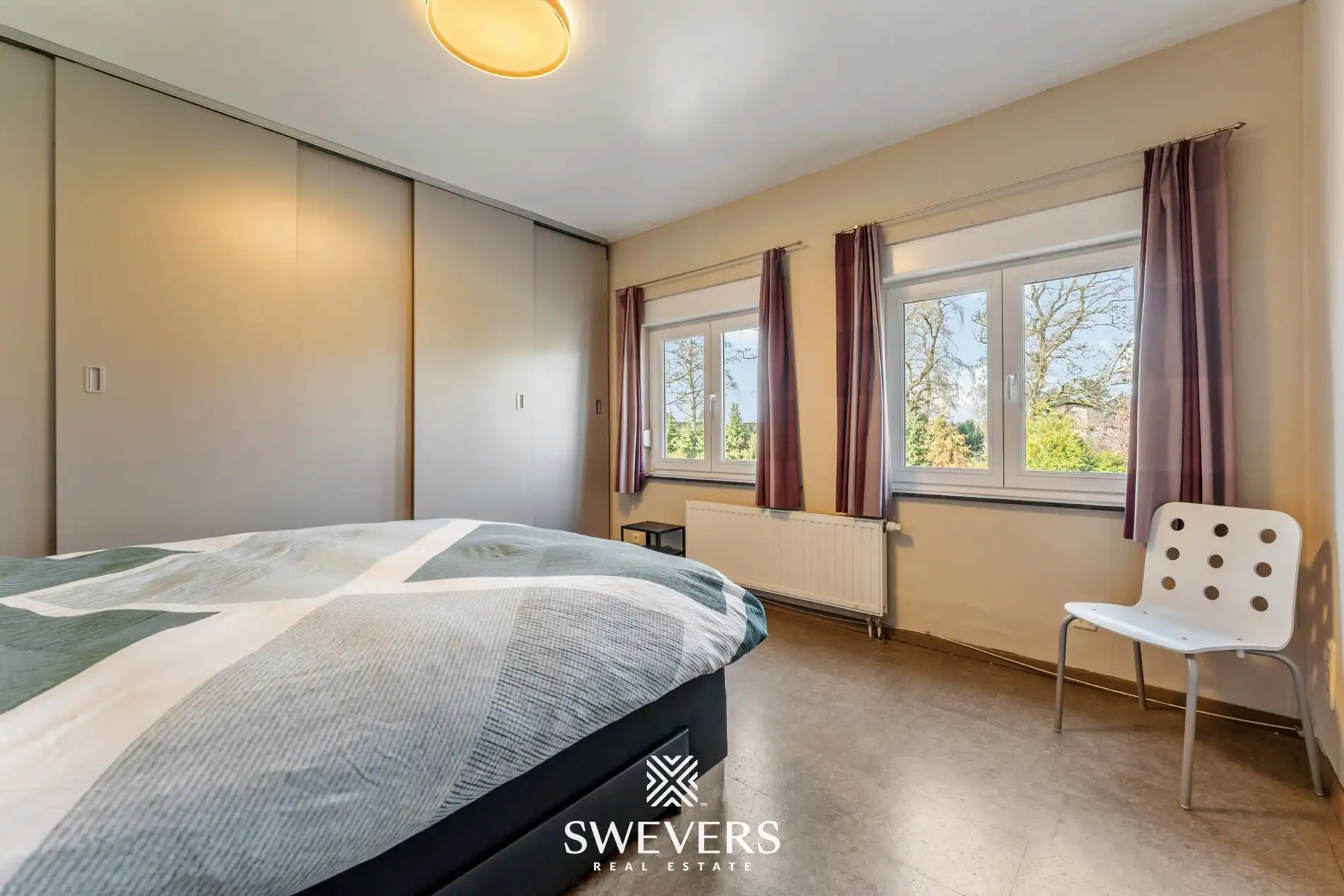 Ruime halfopen woning met zuidoostgerichte tuin en zwembad foto 18