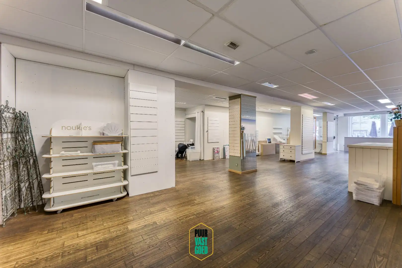 Riant appartement en studio boven grote handelsruimte  foto 5