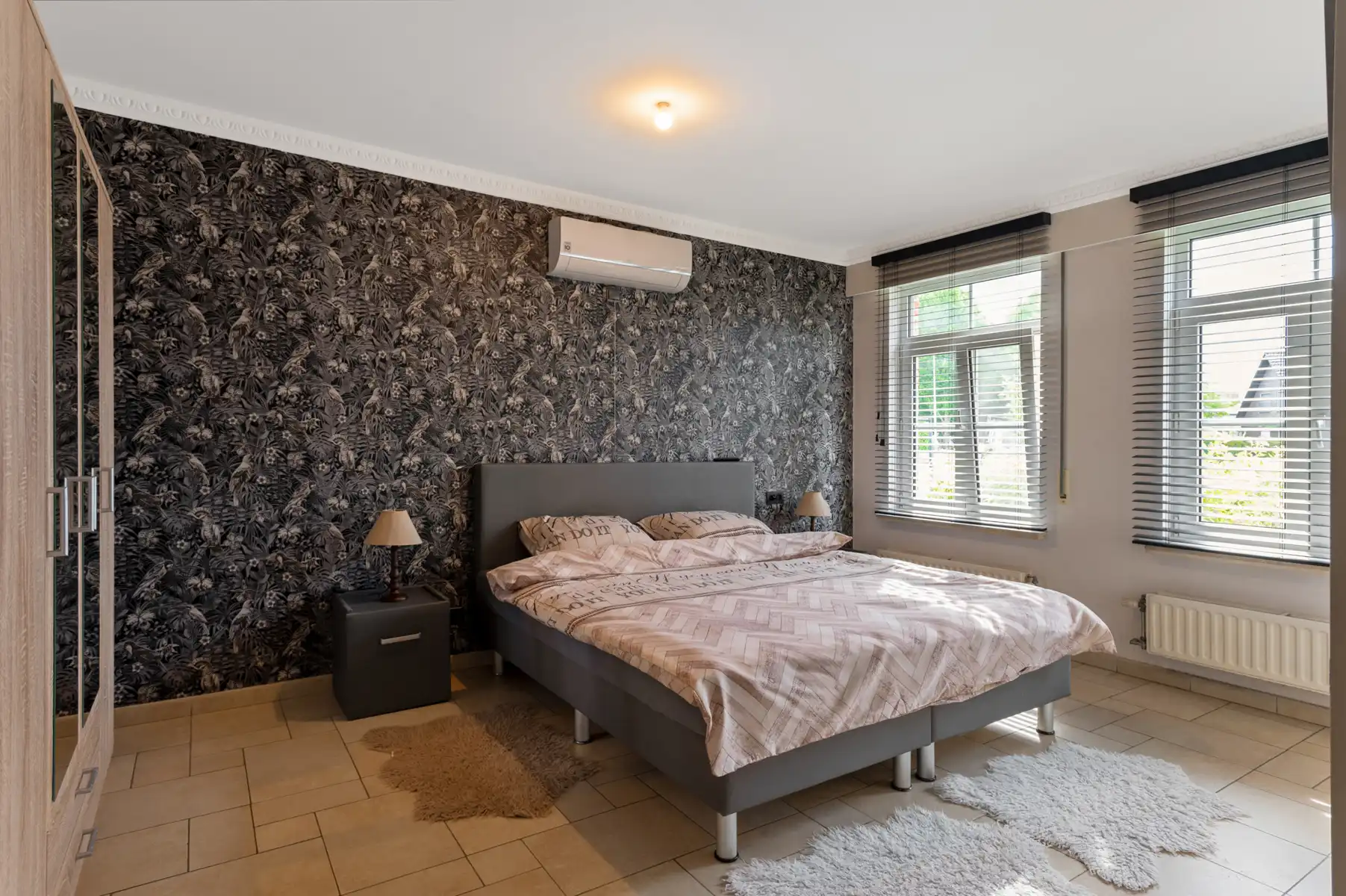 Ruime woning met 4 slpks, 2 bdks, garage en tuin foto 14