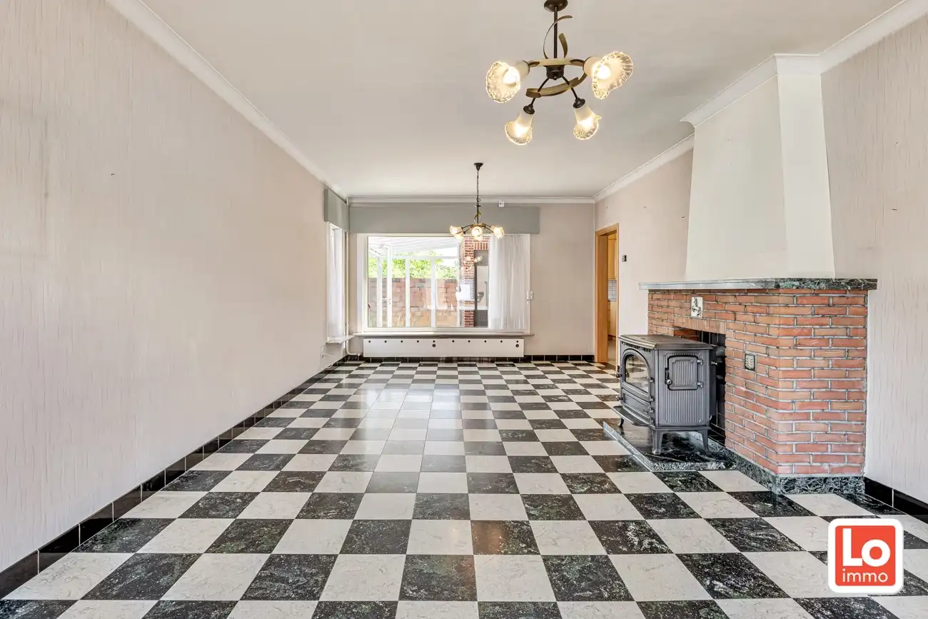 Verder te renoveren halfopen woning en afzonderlijke dubbele garage en stadstuin op een gemakkelijk bereikbare locatie in Hamme! foto 4