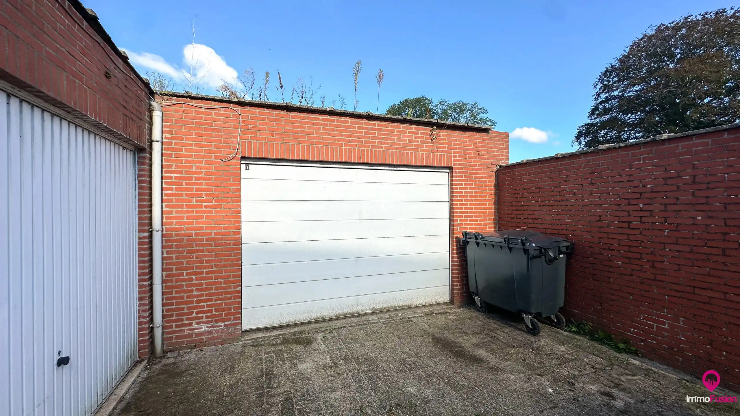 Ruim handelspand met garage in het centrum van Beringen! foto 16