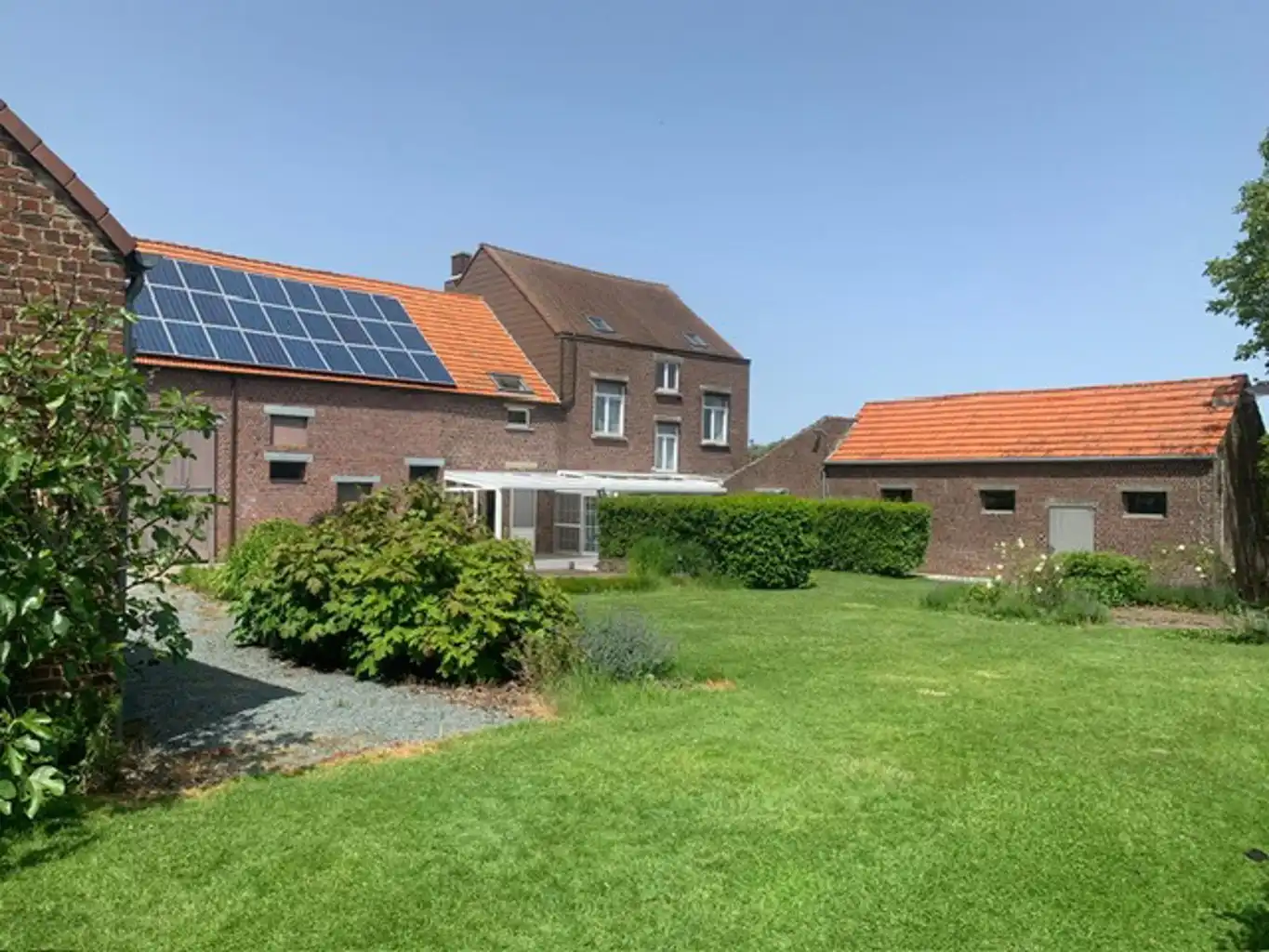 Hoofdfoto van de publicatie: Instapklare droomvierkantshoeve met boomgaard, weilanden 