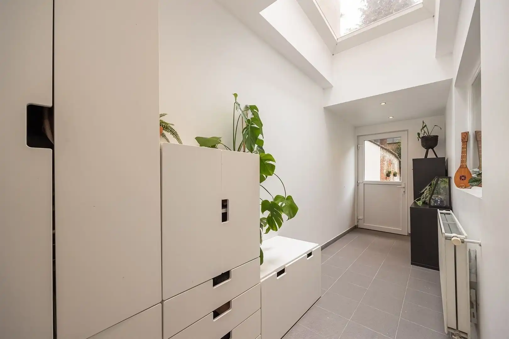 Stadswoning met privatieve tuin & garage foto 5