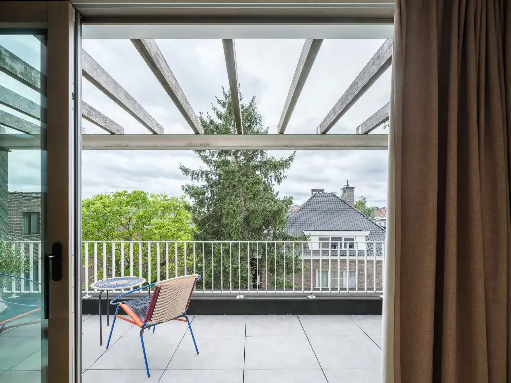 Karaktervolle burgerwoning (225 m²) met romantische tuin, gelegen in de gegeerde stationsbuurt foto 19