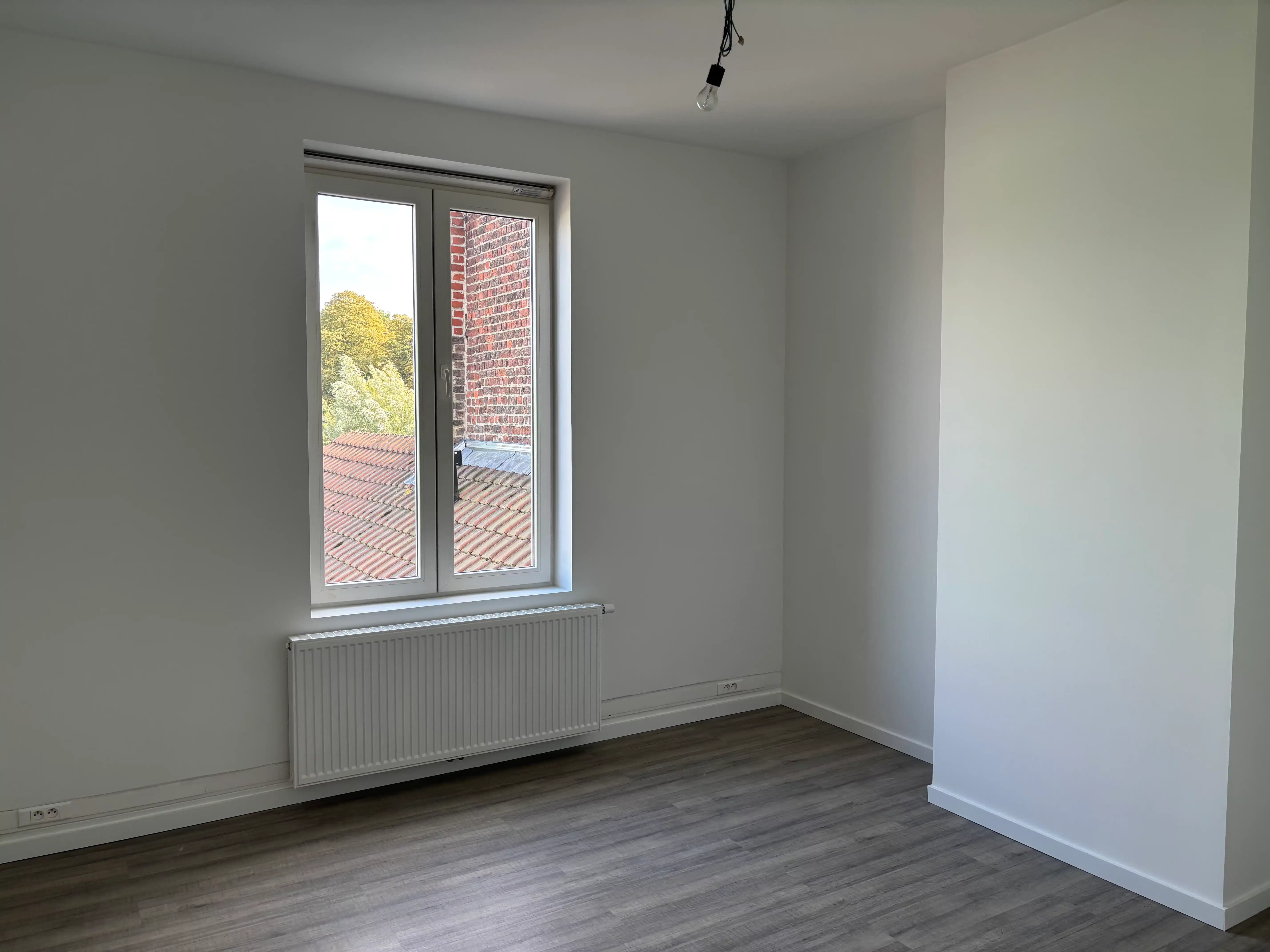 Gezellige rijwoning 4 slaapkamers + garage en stadstuin foto 11